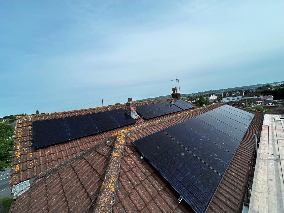Two solar arrays on a profiled tiled roof