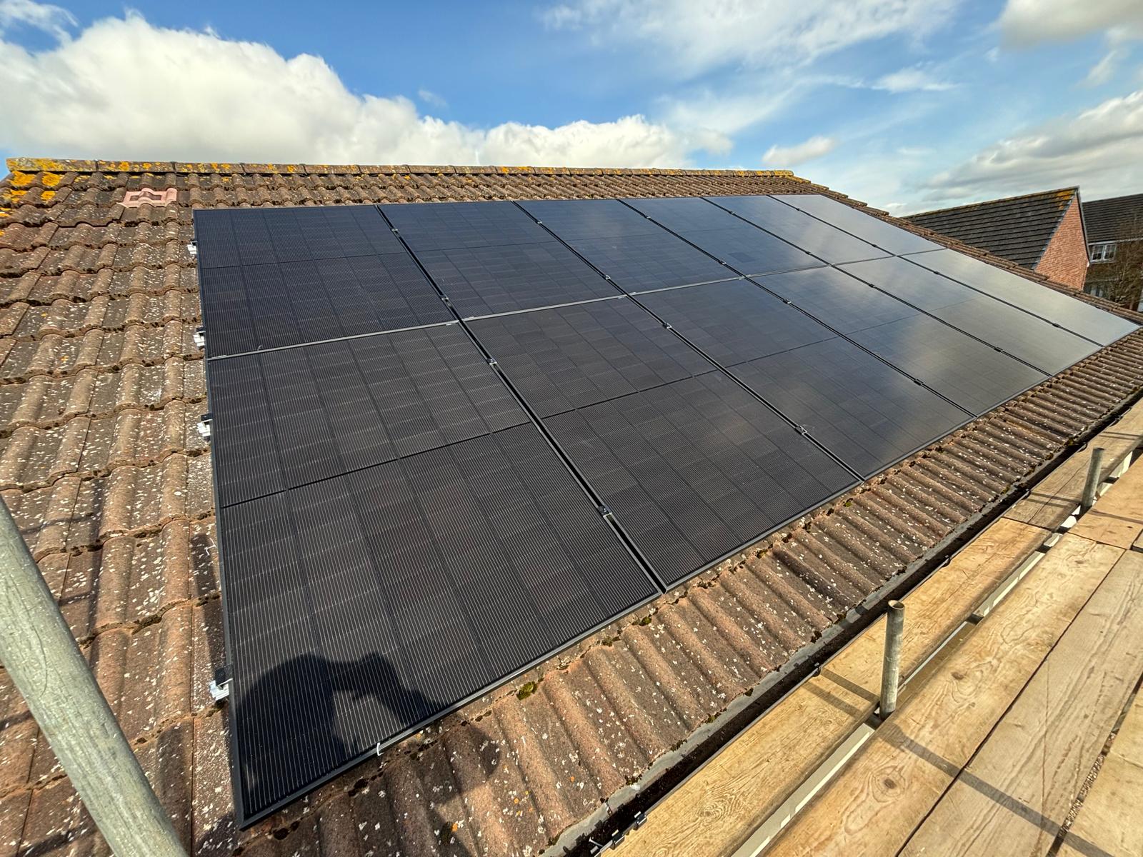 Eight panel solar array on a pitched tiled roof